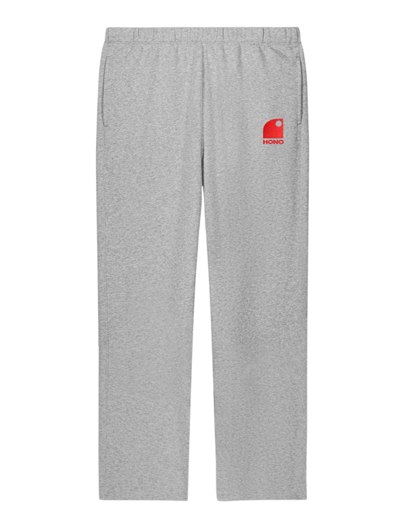 Jogging gris surfwear HONO avec logo corail sur la cuisse, pantalon confortable unisexe style surf premium.