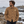 Surchemise HONO en velours  bio côtelé camel portée par un homme face à la mer, dans une ambiance naturelle et authentique du Finistère.