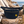 banane en velours bio bleu marine brodée jaune HONO surf  surfwear posée en bord de mer
