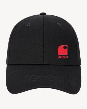 Casquette surf noire HONO Wave broderie corail en coton recyclé, vue de face, style surfwear éco-responsable.