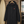 Imperméable léger recyclé noir HONO sur cintre, broderie corail, vêtements de surf surfwear durable et éco-responsable, marque française