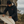 Imperméable recyclé noir HONO HOOdurf doublé en polaire recyclée, broderie corail, vêtements de surf surfwear durable et éco-responsable, marque française