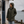 Imperméable kaki HONO doublé polaire avec capuche et broderie noire, porté par une femme, surfwear bio écoresponsable et marque française