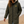 Imperméable surfkaki HONO doublé polaire avec capuche et broderie jaune, porté par une femme sur la plage, surfwear bio écoresponsable et marque surf française