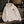 Sweat  surf à capuche écru HONO avec logo vert et noir, posé sur un banc dans un univers surf, surfwear bio écoresponsable et marque française