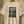 T-shirt surf écru en coton bio HONO avec surf art, création en collab artiste, surfwear français écoresponsable.